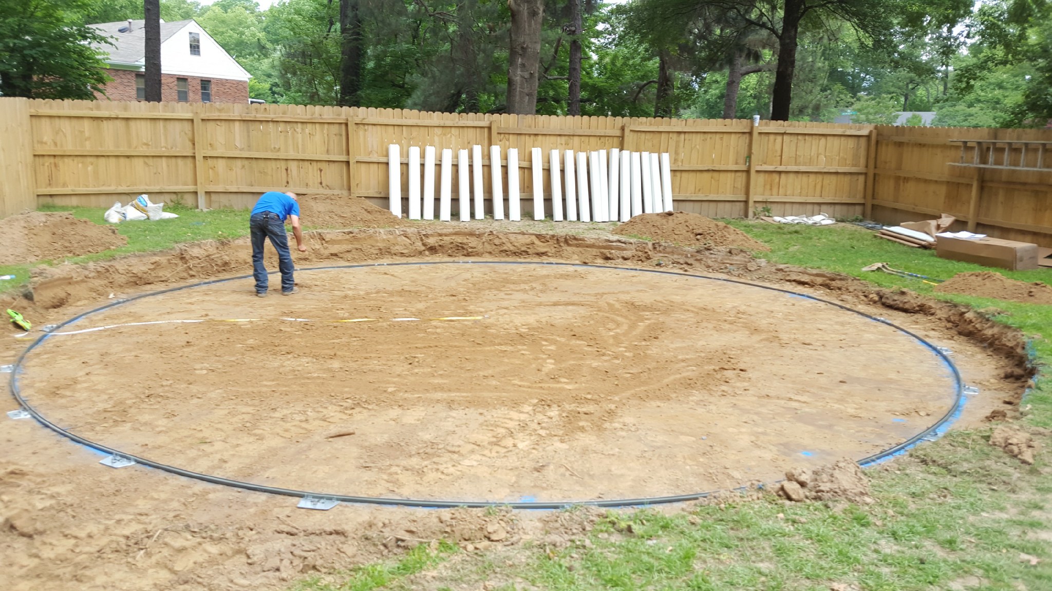 Installing an above ground swimming pool sand base