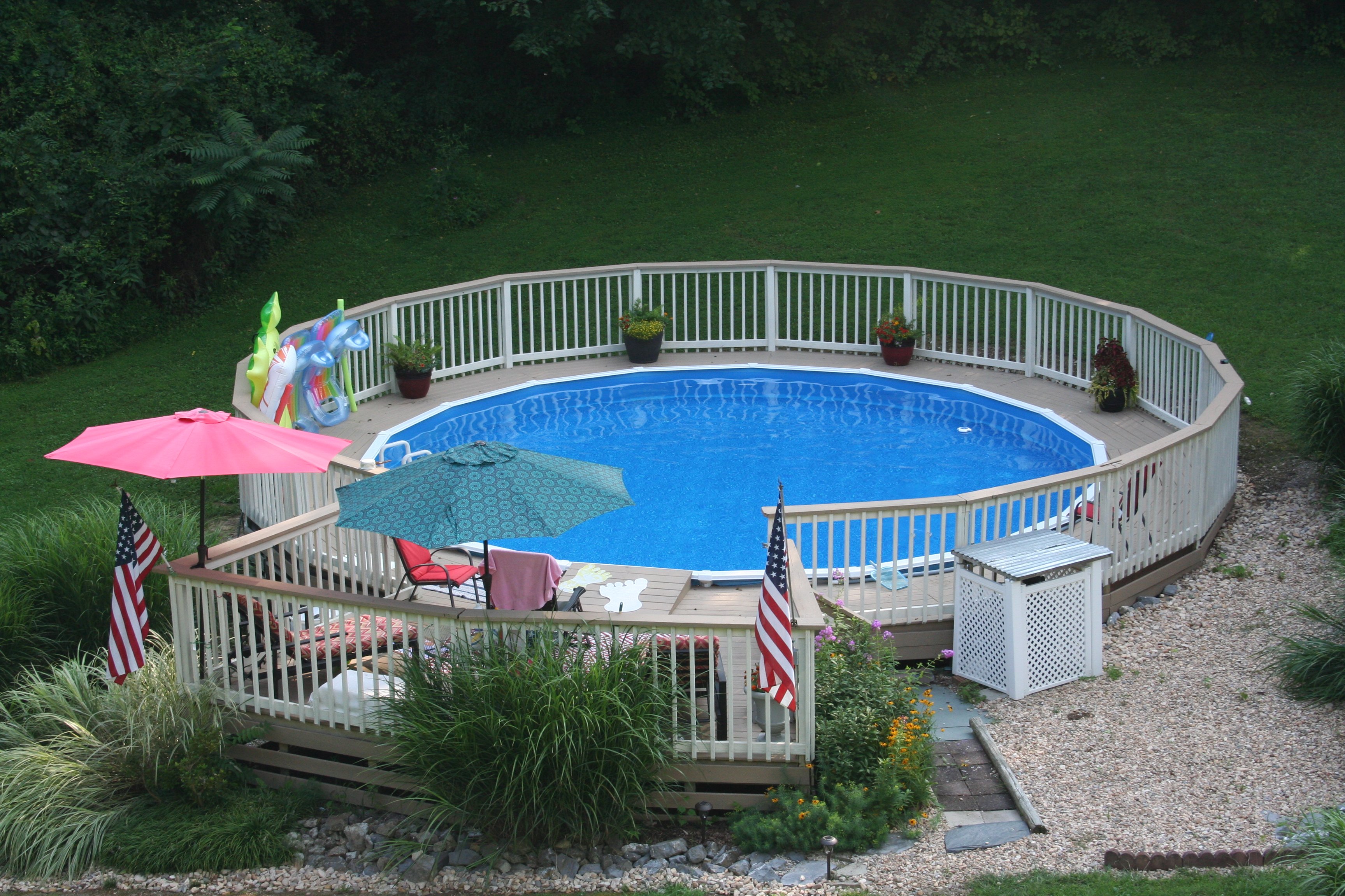 Semi-inground swimming pools for sloping yards