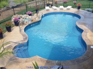 Inground pool with light blue liner