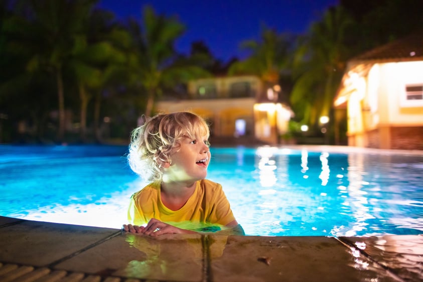 kid in swimming pool