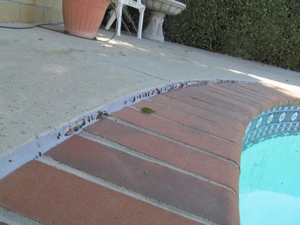 caulk damage repair for pool patio